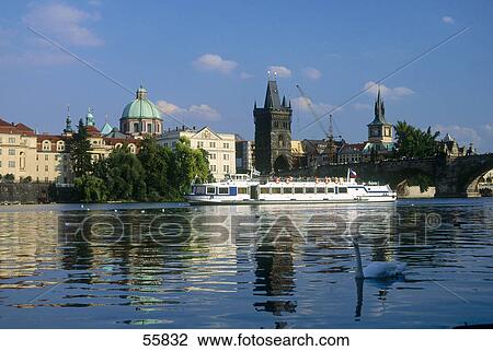 Stock Image - City at waterfront, Vltava River, Prague, Czech Republic . Fotosearch
