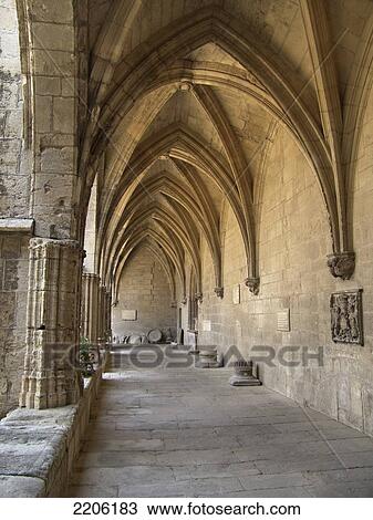 Stock Image - Cloister of church, Saint-Nazaire Cathedral, Beziers, Herault, Languedoc-Roussillon, France . Fotosearch