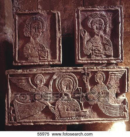Stock Photography - Close-up of carving on wall of church . Fotosearch