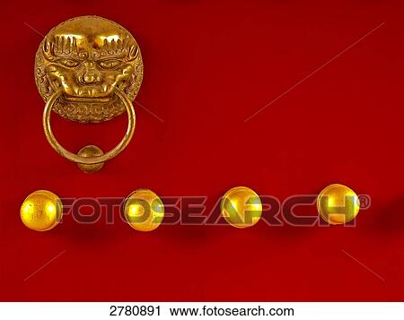 Stock Image - Close-up of doorknob, Miaoying Temple, Beijing, China . Fotosearch