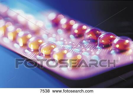 Stock Photo - Close-up of pills in blister pack . Fotosearch
