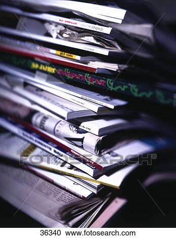 Close-up of stack of magazines and newspapers View Large Photo Image Stock Image - Close-up of stack of magazines and newspapers . Fotosearch