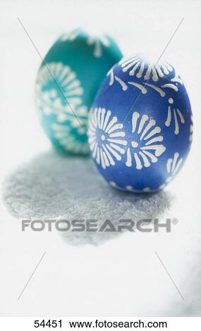 Stock Image - Close-up of two traditional painted easter eggs . Fotosearch