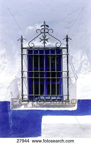 Close-up of window with grille View Large Photo Image Picture - Close-up of window with grille . Fotosearch