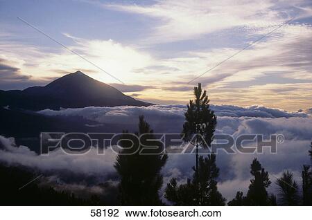 Clouds over mountains, Mt Teide, Tenerife, Canary Islands, Spain View Large Photo Image Stock Image - Clouds over mountains, Mt Teide, Tenerife, Canary Islands, Spain . Fotosearch