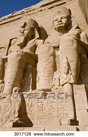 Colossal statues at the Temple of Ramesses II in Abu Simbel, Egypt, low angle view, close-up View Large Photo Image Stock Photo - Colossal statues at the Temple of Ramesses II in Abu Simbel, Egypt, low angle view, close-up . Fotosearch