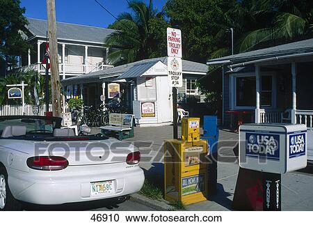 Convertible car parked near newspaper boxes, Key West, Florida, USA View Large Photo Image Stock Image - Convertible car parked near newspaper boxes, Key West, Florida, USA . Fotosearch