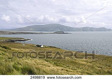 Stock Photo - Cottage at coast, Achill Island, County Mayo, Connacht, Republic of Ireland . Fotosearch