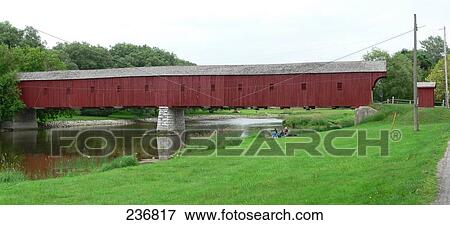 Stock Photo - Covered bridge over river, West Montrose Covered Bridge, West Montrose, Ontario, Canada . Fotosearch