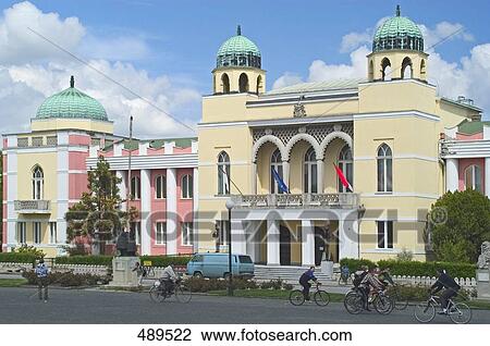 Cyclist in front of government building, Mohacs, Hungry View Large Photo Image Stock Image - Cyclist in front of government building, Mohacs, Hungry . Fotosearch