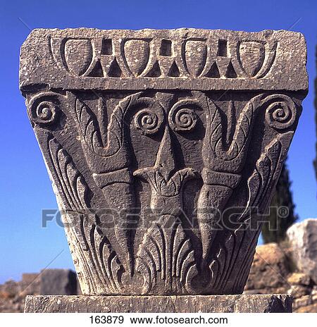 Stock Photo - Detail carving on stone, Volubilis, Morocco . Fotosearch