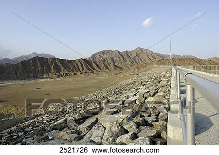 Dry reservoir at roadside, Wadi Wurayah, Fujairah, United Arab Emirates View Large Photo Image Stock Photograph - Dry reservoir at roadside, Wadi Wurayah, Fujairah, United Arab Emirates . Fotosearch