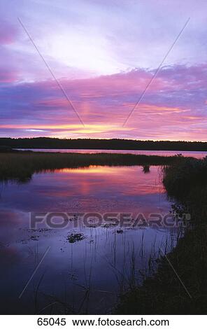 Dusky sky reflected in river water, Dal River, Dalarna, Sweden  View Large Photo Image Stock Photography - Dusky sky reflected in river water, Dal River, Dalarna, Sweden . Fotosearch