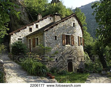 Empty paths in front of house on hill, Saint Chely du Tarn, France View Large Photo Image Stock Photo - Empty paths in front of house on hill, Saint Chely du Tarn, France . Fotosearch