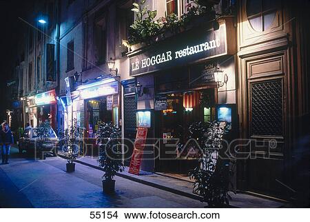 Facade of restaurant lit up at night, Saint-Germain-Des-Pres, Paris, Ile-De-France, France View Large Photo Image Picture - Facade of restaurant lit up at night, Saint-Germain-Des-Pres, Paris, Ile-De-France, France . Fotosearch