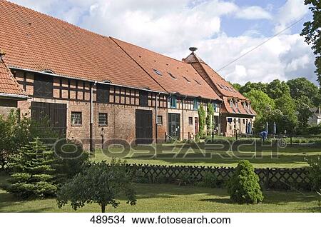 Formal garden in front of lodge, germany View Large Photo Image Picture - Formal garden in front of lodge, germany . Fotosearch