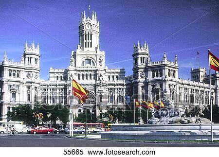 Stock Photography - Fountain in front of government building, Plaza De Cibeles, Palacio De Comunicaciones, Madrid, Spain . Fotosearch
