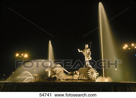 Fountain lit up at night, Neptune Fountain, Madrid, Spain View Large Photo Image Stock Image - Fountain lit up at night, Neptune Fountain, Madrid, Spain . Fotosearch