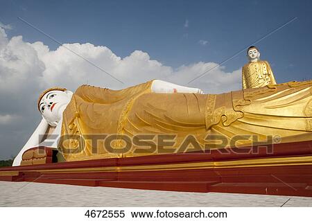 Giant standing and reclining Buddha, Monywa, Myanmar View Large Photo Image Stock Photography - Giant standing and reclining Buddha, Monywa, Myanmar . Fotosearch