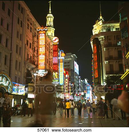 Group of people walking along illuminated street, Nanjing Road, Shanghai, China, Asia View Large Photo Image Stock Image - Group of people walking along illuminated street, Nanjing Road, Shanghai, China, Asia . Fotosearch