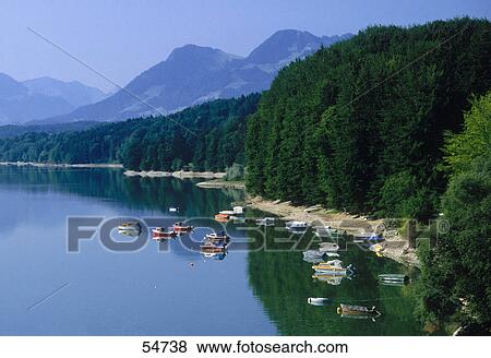 High angle view of boats in lake, Lake of Gruyere, Canton of Fribourg, Switzerland View Large Photo Image Stock Photo - High angle view of boats in lake, Lake of Gruyere, Canton of Fribourg, Switzerland . Fotosearch