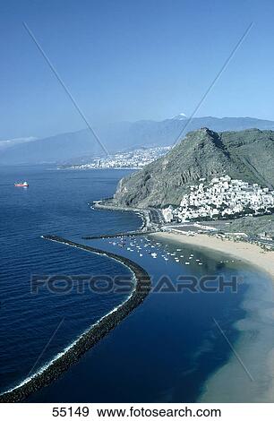 Stock Photo - High angle view of city at coast, Santa Cruz De Tenerife, Canary Islands, Spain . Fotosearch