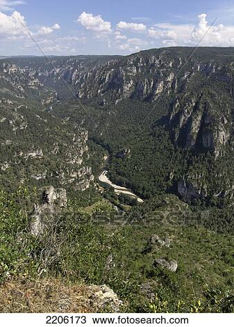 High angle view of river flowing through mountains, Point Sublime, Lozere, Languedoc-Roussillon, France View Large Photo Image Stock Image - High angle view of river flowing through mountains, Point Sublime, Lozere, Languedoc-Roussillon, France . Fotosearch