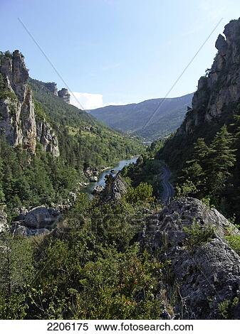 High angle view of river flowing through mountains, Tarn, Midi-Pyrenees, France View Large Photo Image Stock Photography - High angle view of river flowing through mountains, Tarn, Midi-Pyrenees, France . Fotosearch