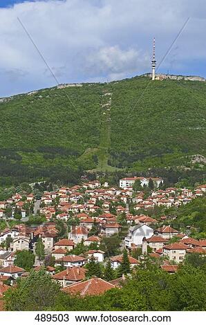High angle view of town with communications tower in background, Belogradchik, Vidin, Romania View Large Photo Image Stock Image - High angle view of town with communications tower in background, Belogradchik, Vidin, Romania . Fotosearch