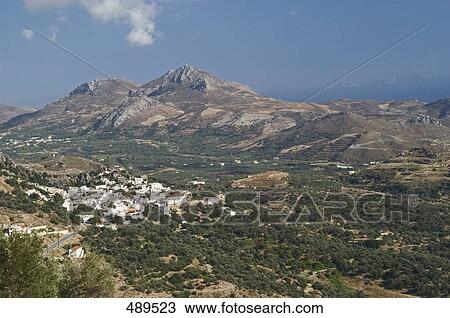 High angle view of village in valley, Plakias, Crete, Greece View Large Photo Image Stock Image - High angle view of village in valley, Plakias, Crete, Greece . Fotosearch