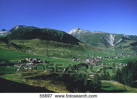 Stock Photo - High angle view of village in valley, Camischolas, Rueras, Graubunden Canton, Switzerland . Fotosearch