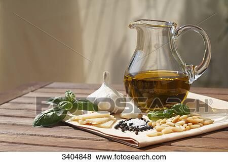 Ingredients for basil pesto on a wooden table View Large Photo Image Stock Photo - Ingredients for basil pesto on a wooden table . Fotosearch