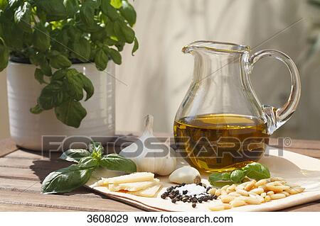 Ingredients for basil pesto on wooden table View Large Photo Image Stock Photo - Ingredients for basil pesto on wooden table . Fotosearch
