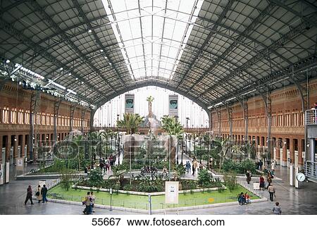 Stock Photo - Interiors of railway station, Madrid Atocha Railway Station, Madrid, Spain . Fotosearch