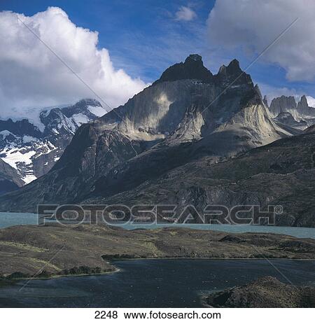 Lake in front of mountain range, Torres del Paine National Park, Chile View Large Photo Image Stock Photo - Lake in front of mountain range, Torres del Paine National Park, Chile . Fotosearch