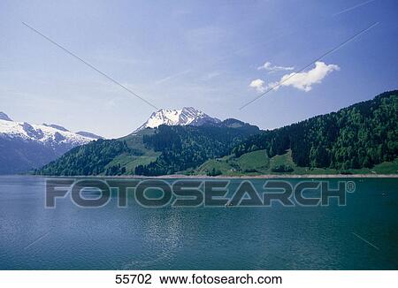 Lake in front of mountains, Wagitalersee, Schwyz, Switzerland View Large Photo Image Stock Image - Lake in front of mountains, Wagitalersee, Schwyz, Switzerland . Fotosearch