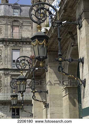 Lantern in front of building, Beziers, Herault, Languedoc-Roussillon, France View Large Photo Image Stock Image - Lantern in front of building, Beziers, Herault, Languedoc-Roussillon, France . Fotosearch