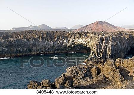 Stock Photo - Lava coast Los Hervideros, Lanzarote, Spain, elevated view . Fotosearch