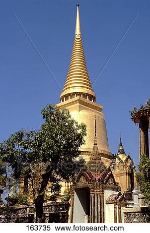 Stock Photography - Low angle view of Buddhist temple, Wat Phra Kaeo, Bangkok, Thailand . Fotosearch
