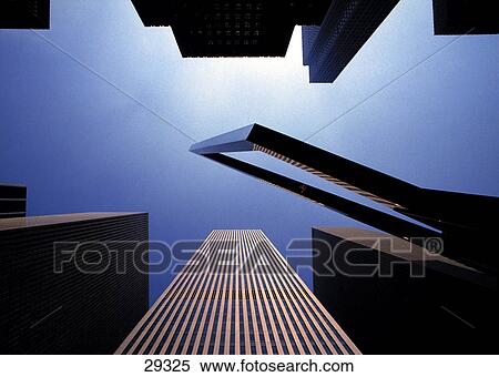 Low angle view of buildings in city, Sixth Avenue, New York City, New York State, USA View Large Photo Image Stock Photography - Low angle view of buildings in city, Sixth Avenue, New York City, New York State, USA . Fotosearch