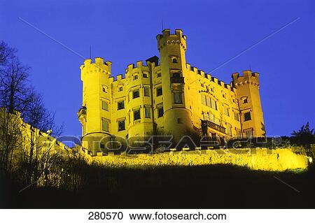 Low angle view of castle lit up at night, Hohenschwangau Castle, Hohenschwangau, Bavaria, Germany View Large Photo Image Stock Image - Low angle view of castle lit up at night, Hohenschwangau Castle, Hohenschwangau, Bavaria, Germany . Fotosearch