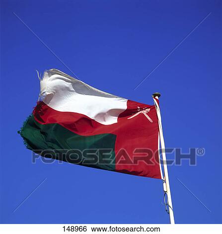 Low angle view of flag of Oman View Large Photo Image Stock Photograph - Low angle view of flag of Oman . Fotosearch