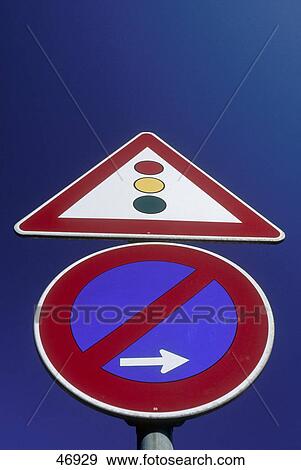 Low angle view of traffic signs View Large Photo Image Stock Photo - Low angle view of traffic signs . Fotosearch