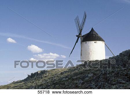 Low angle view of windmill on hill, Consuegra, Toledo Province, Castilla La Mancha, Spain View Large Photo Image Stock Photo - Low angle view of windmill on hill, Consuegra, Toledo Province, Castilla La Mancha, Spain . Fotosearch