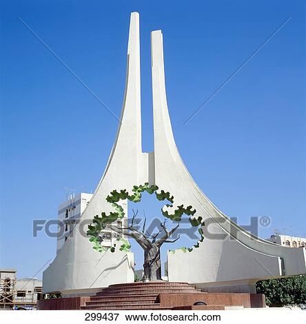 Stock Photo - Monument against clear blue sky, Rolla Square, Sharjah, UNITED ARAB EMIRATES . Fotosearch