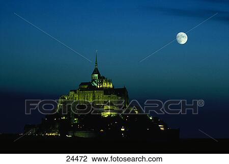 Moon gloving over cathedral, Mont Saint-Michel, Normandy, France View Large Photo Image Stock Image - Moon gloving over cathedral, Mont Saint-Michel, Normandy, France . Fotosearch