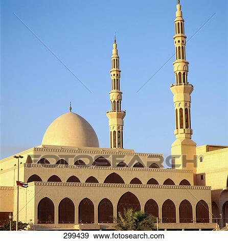Mosque against clear blue sky, Facade, King Faisal Mosque, Sharjah, UNITED ARAB EMIRATES View Large Photo Image Stock Photo - Mosque against clear blue sky, Facade, King Faisal Mosque, Sharjah, UNITED ARAB EMIRATES . Fotosearch