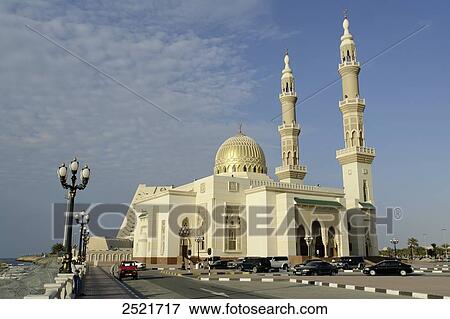 Stock Photo - Mosque at roadside, Corniche Mosque, Sharjah, United Arab Emirates . Fotosearch