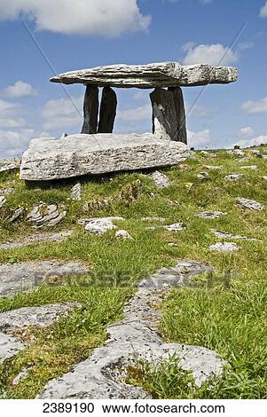Stock Image - Neolithic stone on landscape . Fotosearch