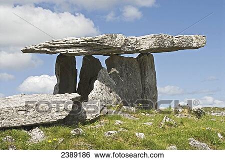 Neolithic stone on landscape View Large Photo Image Stock Photograph - Neolithic stone on landscape . Fotosearch